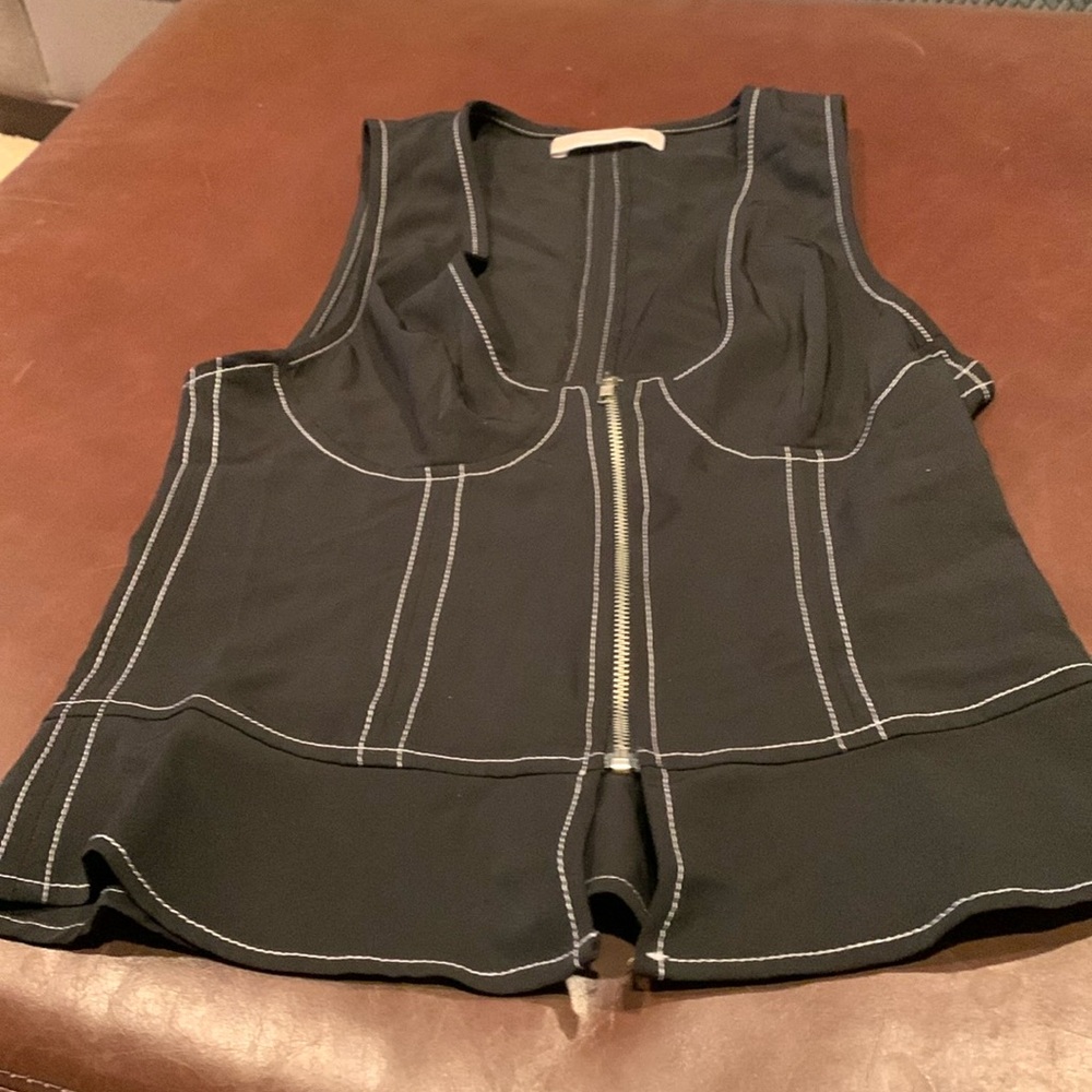 Women’s black top.